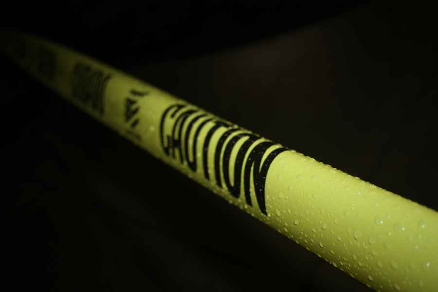 yellow caution tape on a black background